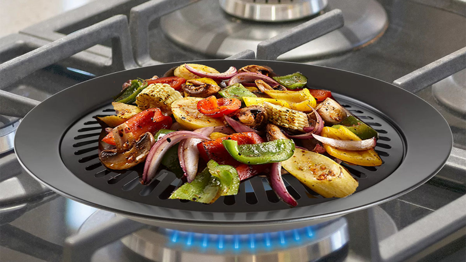 smokeless grill attachment on stove wit peppers and onions