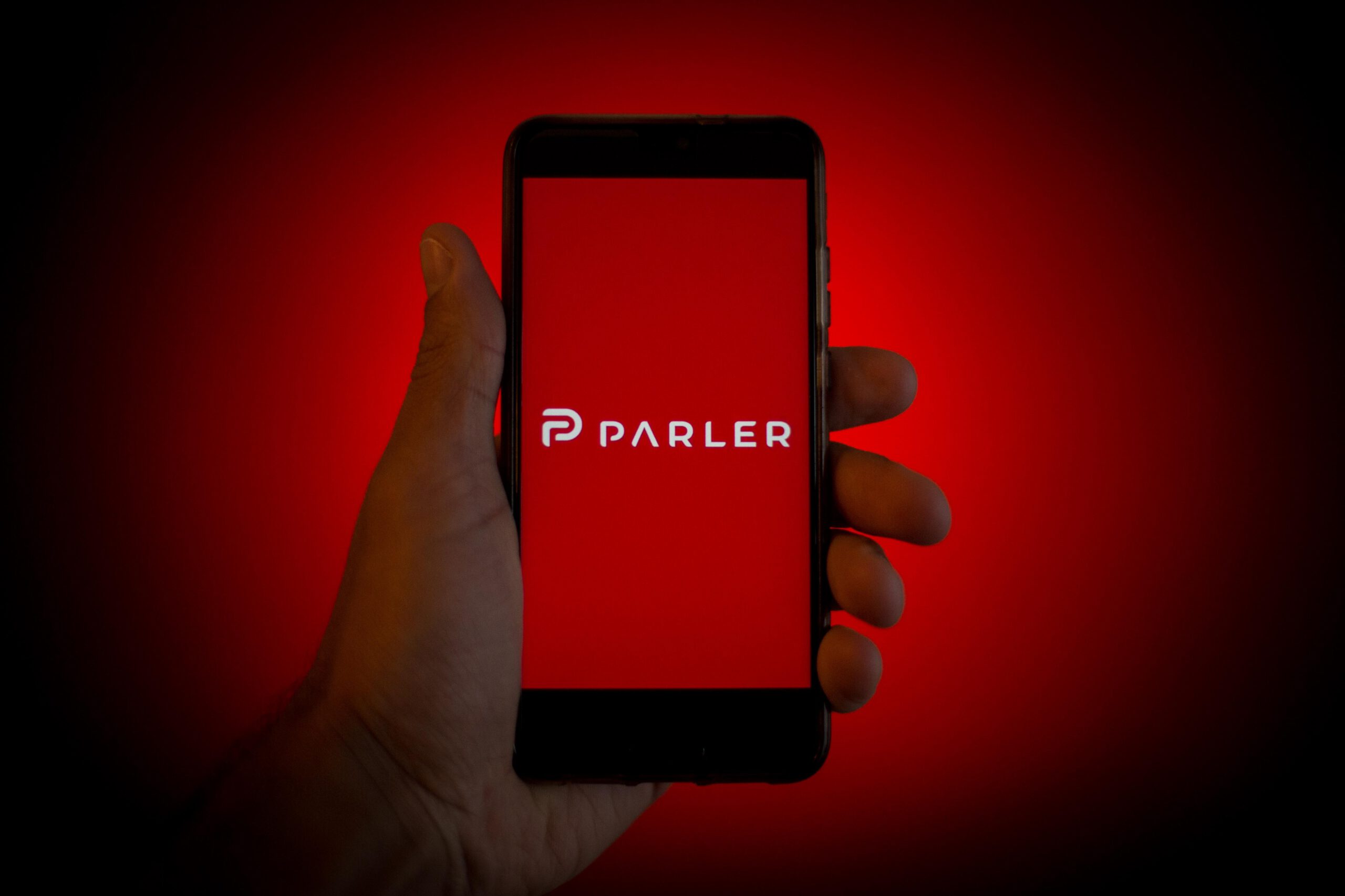 photo illustration a Parler logo is seen displayed on a smartphone