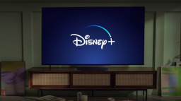 The Disney Plus logo is shown on a large flat-screen TV.