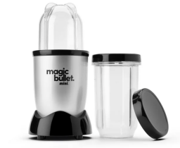 Magic bullet with small jar on top of base, extra jar and lid to the right