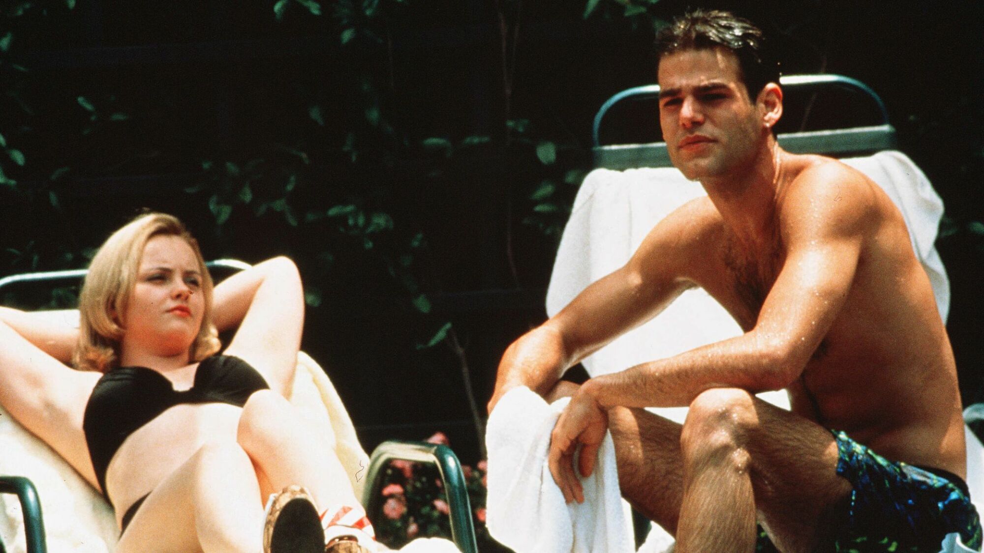 Christina Ricci and Ivan Sergei lounge poolside in "The Opposite of Sex."