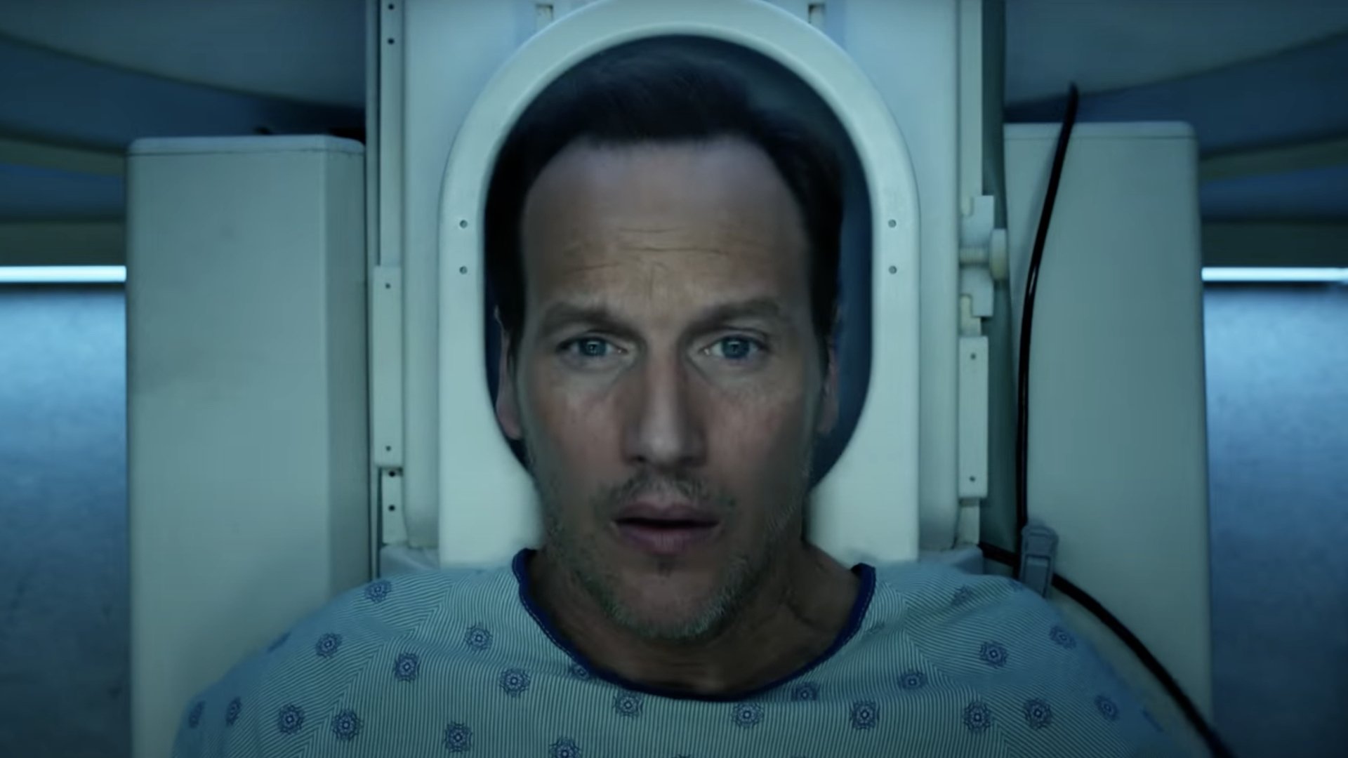 A man lies in a CT scan in the film 