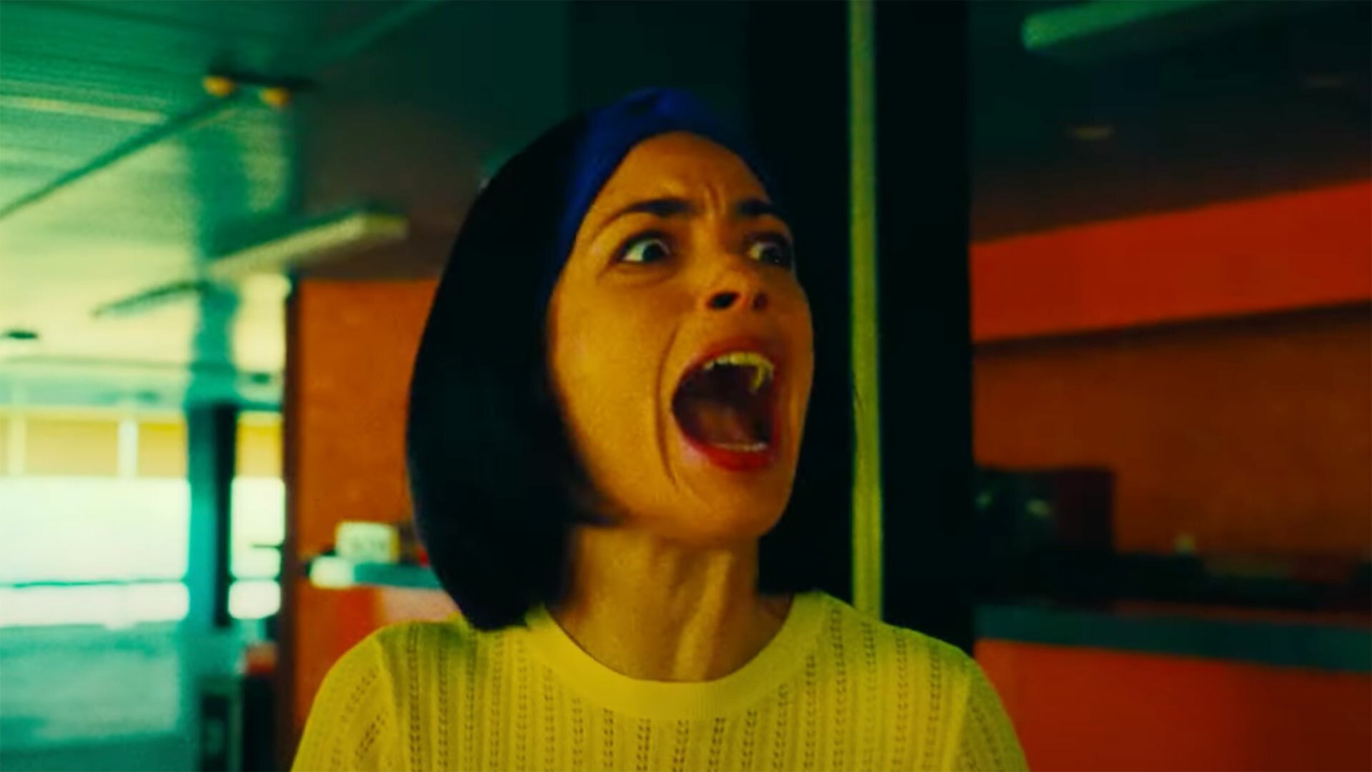 A close-up of a woman screaming.