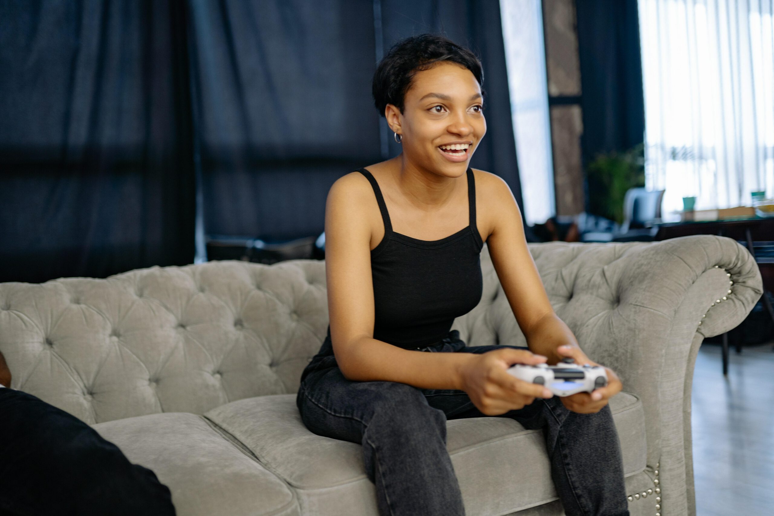 Girl gamer holding controller