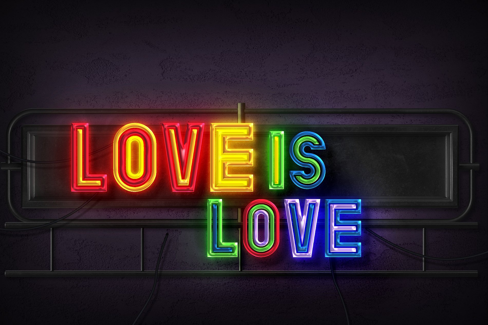Love is love text in rainbow neon style on wall 