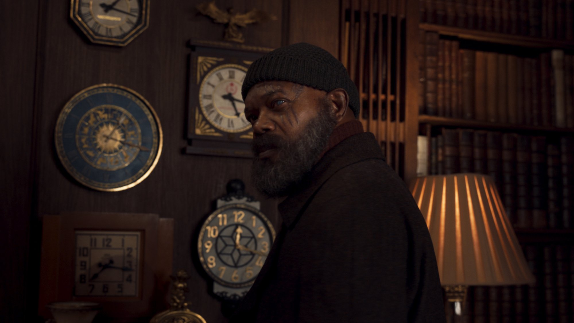 In the Marvel series "Secret Invasion" Samuel L. Jackson's character Nick Fury stands in a study filled with clocks.