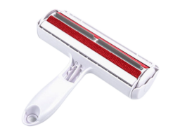 Red and white ChomChom pet hair remover on white background