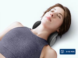 woman sleeping on a neck pillow