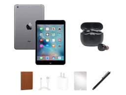 Apple iPad mini 2 pictured with its accompanying accessories like headphones, charger, stylus, and more.