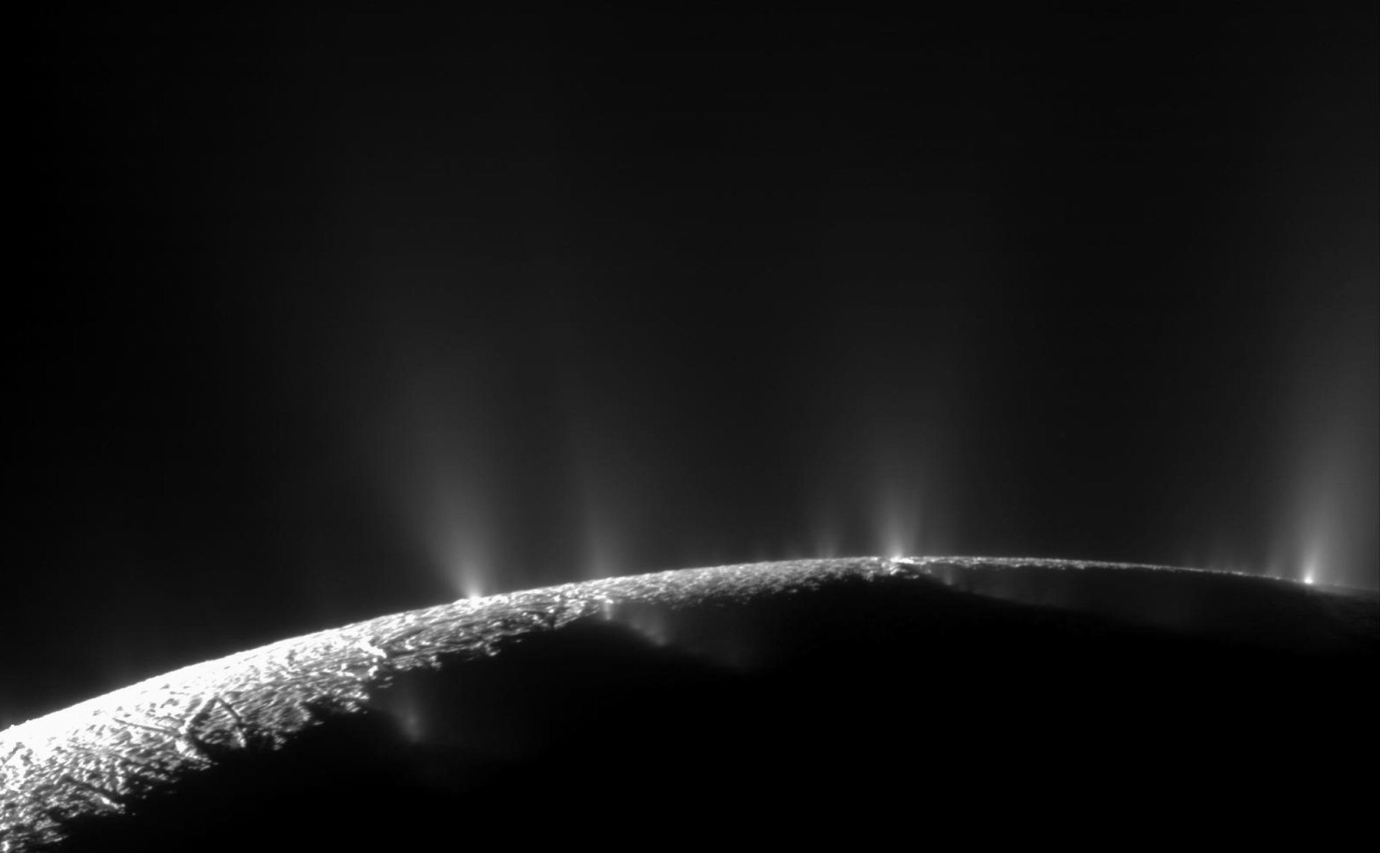 plumes shooting our of the moon Enceladus