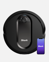 Black circular vacuum propped upright with a phone to its right depicting the Shark app application