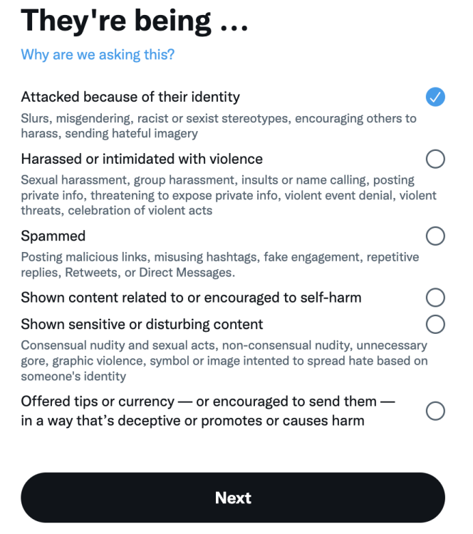 A screenshot of the options when reporting a tweet, with "Attacked because of their identity," selected.