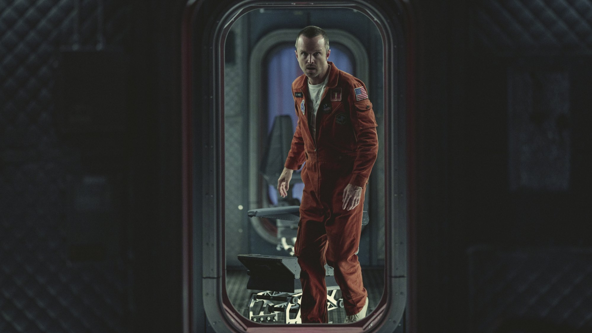 In the TV show "Black Mirror" Aaron Paul is an astronaut standing in a curved doorway.