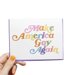 White horizontal greeting card that says "Make America Gay Again" on it in pastel rainbow letters