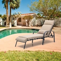 lounge chair out next to the pool