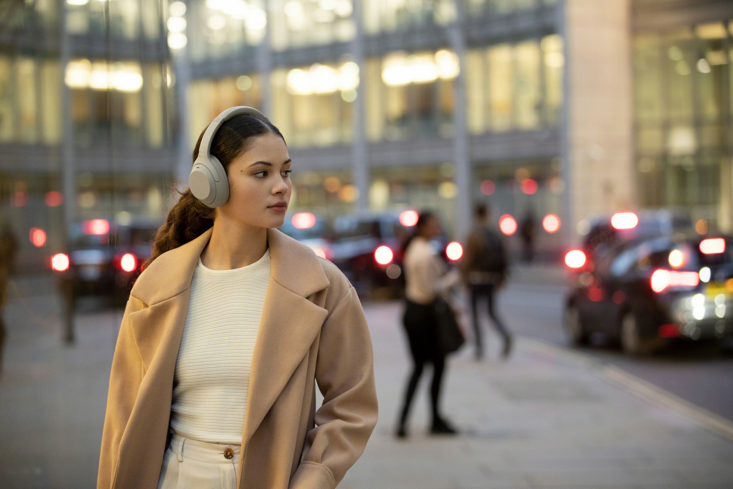 Girl wearing Sony WH-1000XM4 wireless headphones