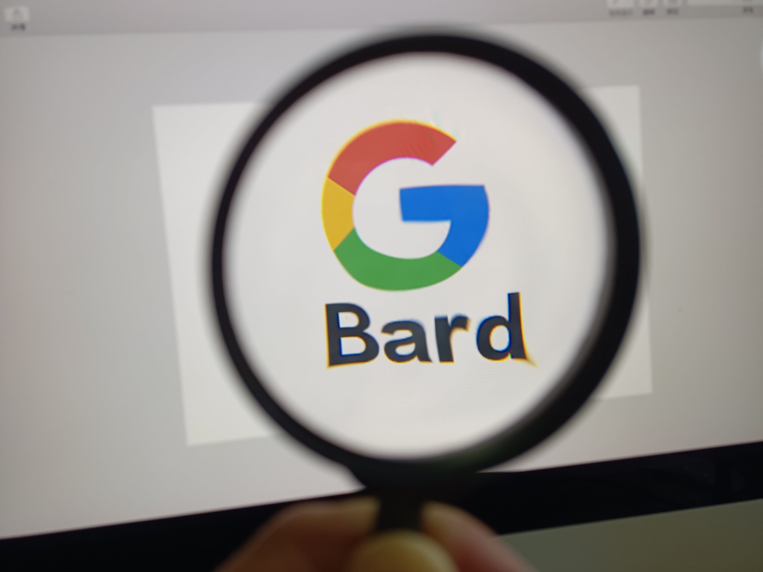 the Bard logo under a magnifying glass