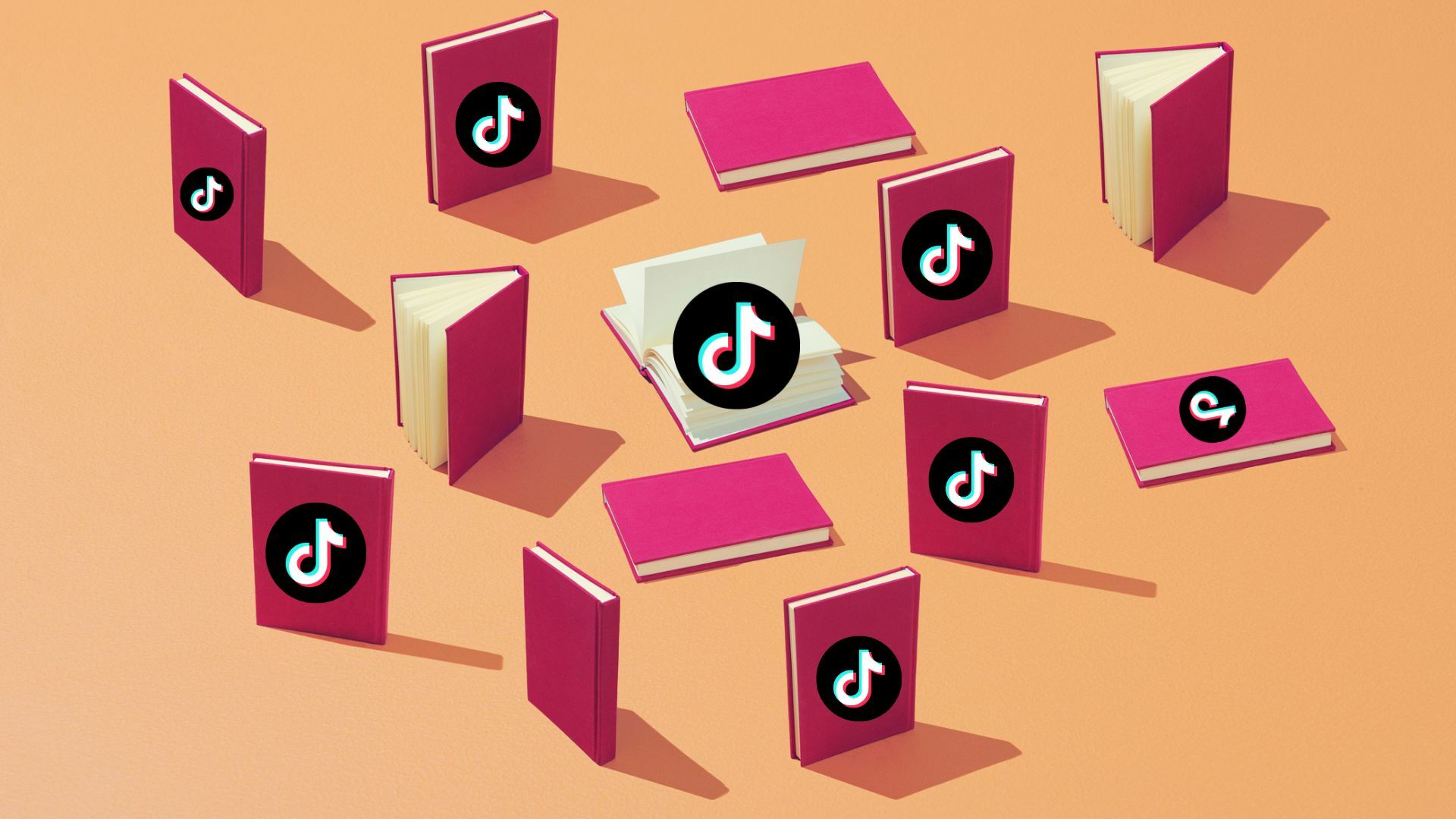 A bunch of books in shades of pink, covered with the TikTok logo.
