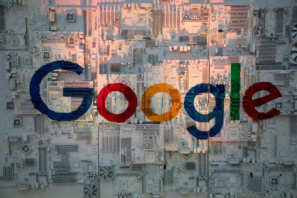 Google logo on white computer chips.