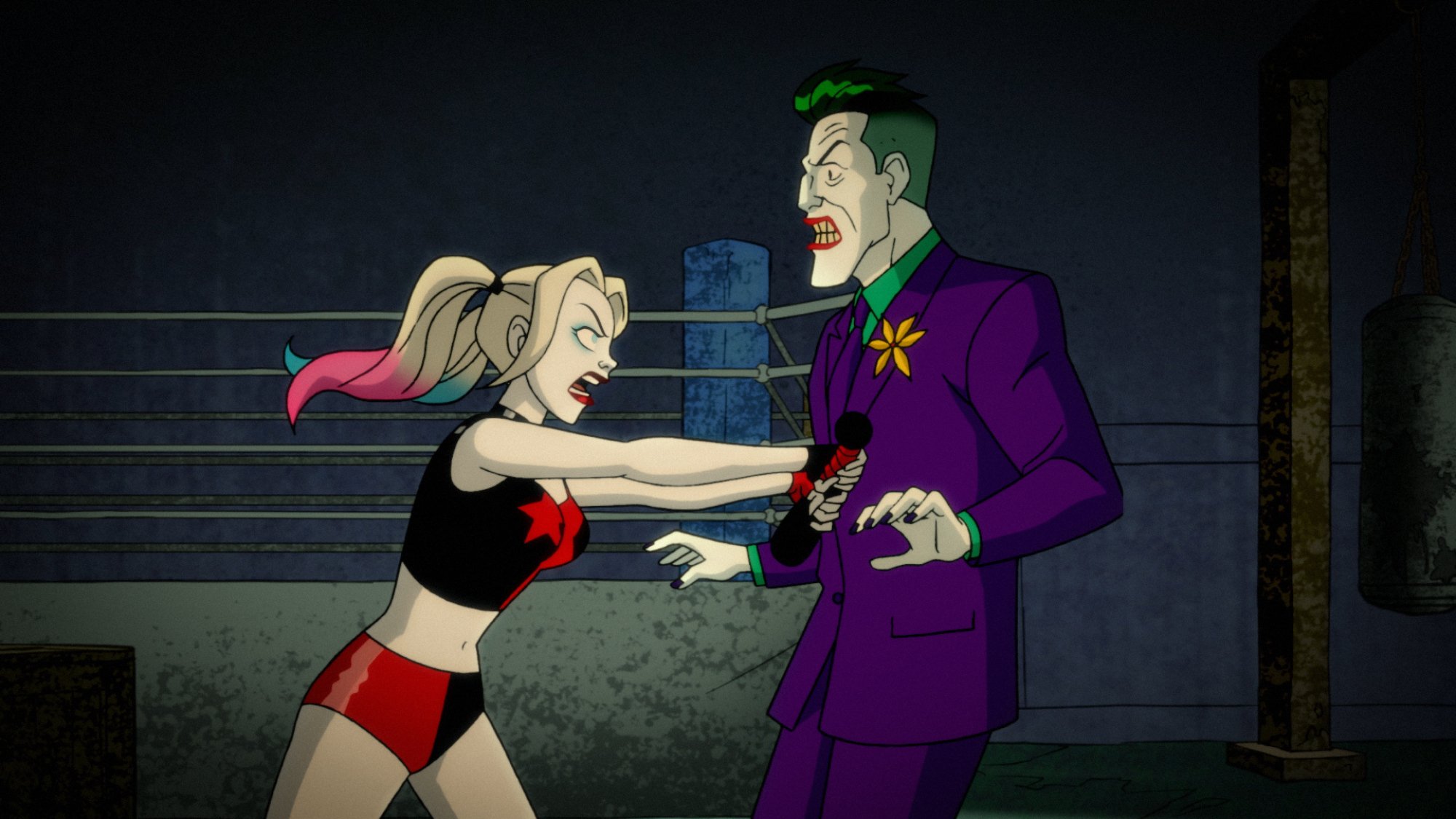 Harley Quinn pushing the Joker in 