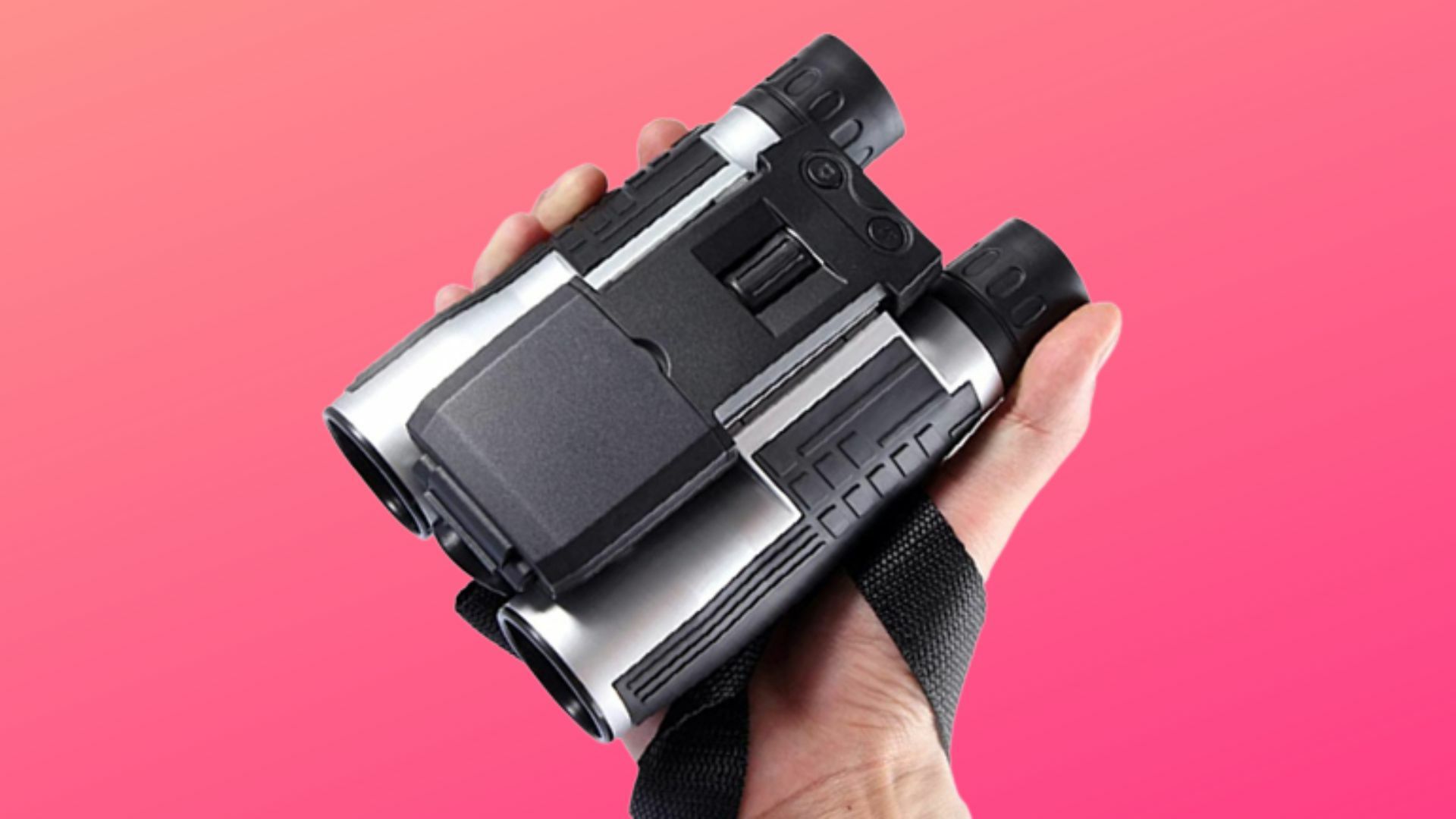 hand holding binocular camera