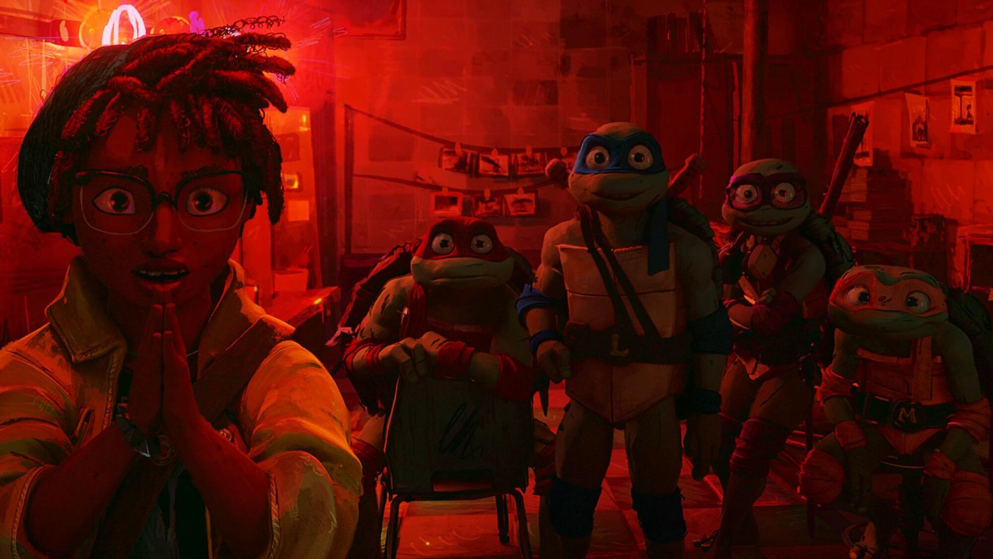 April O'Neil and the turtles in "Teenage Mutant Ninja Turtles: Mutant Mayhem."