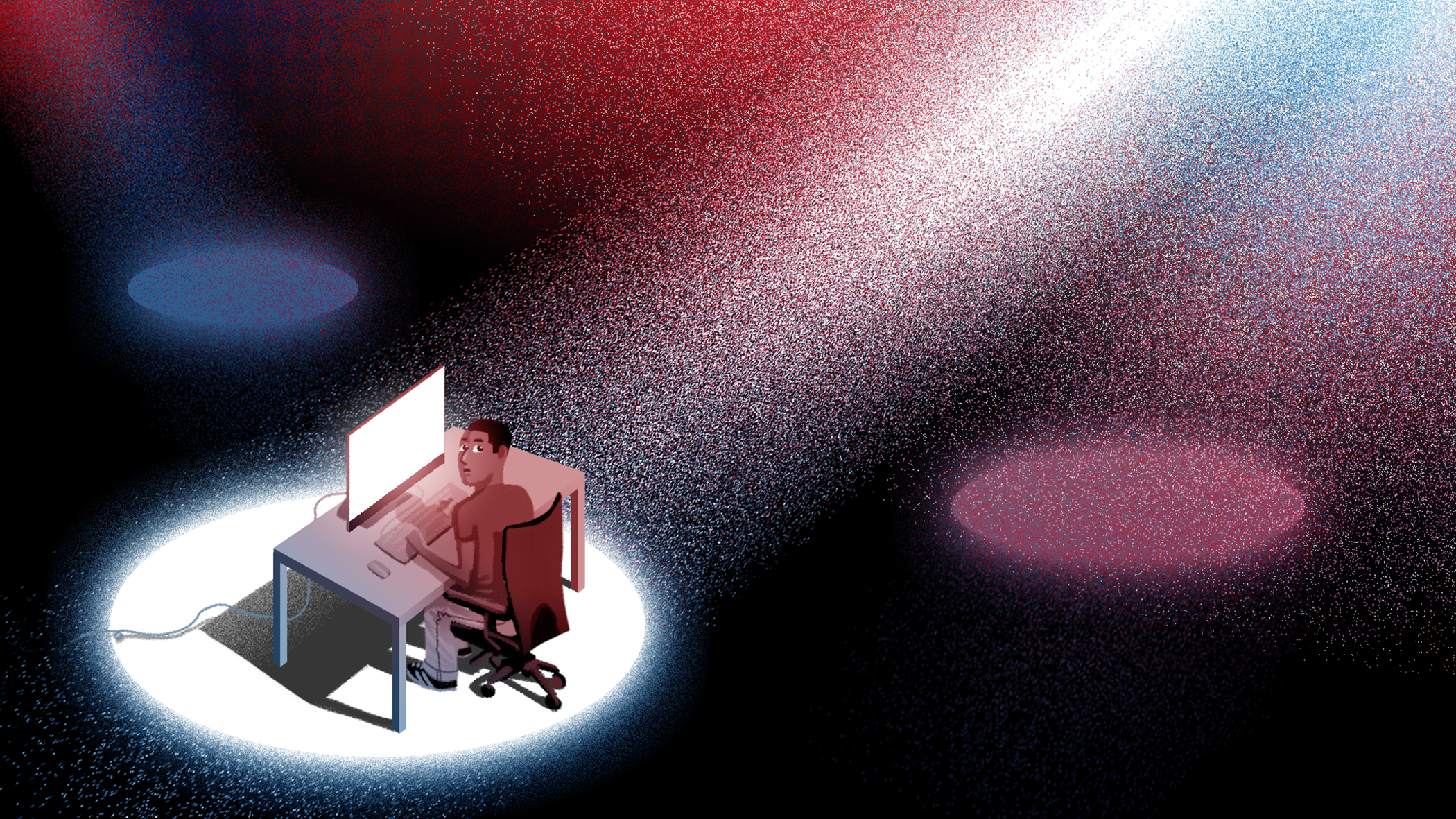 A spotlight shines on a man at his computer desk.