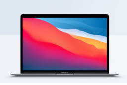 MacBook Air with gradient sunset background (purple, red, orange, and blue)