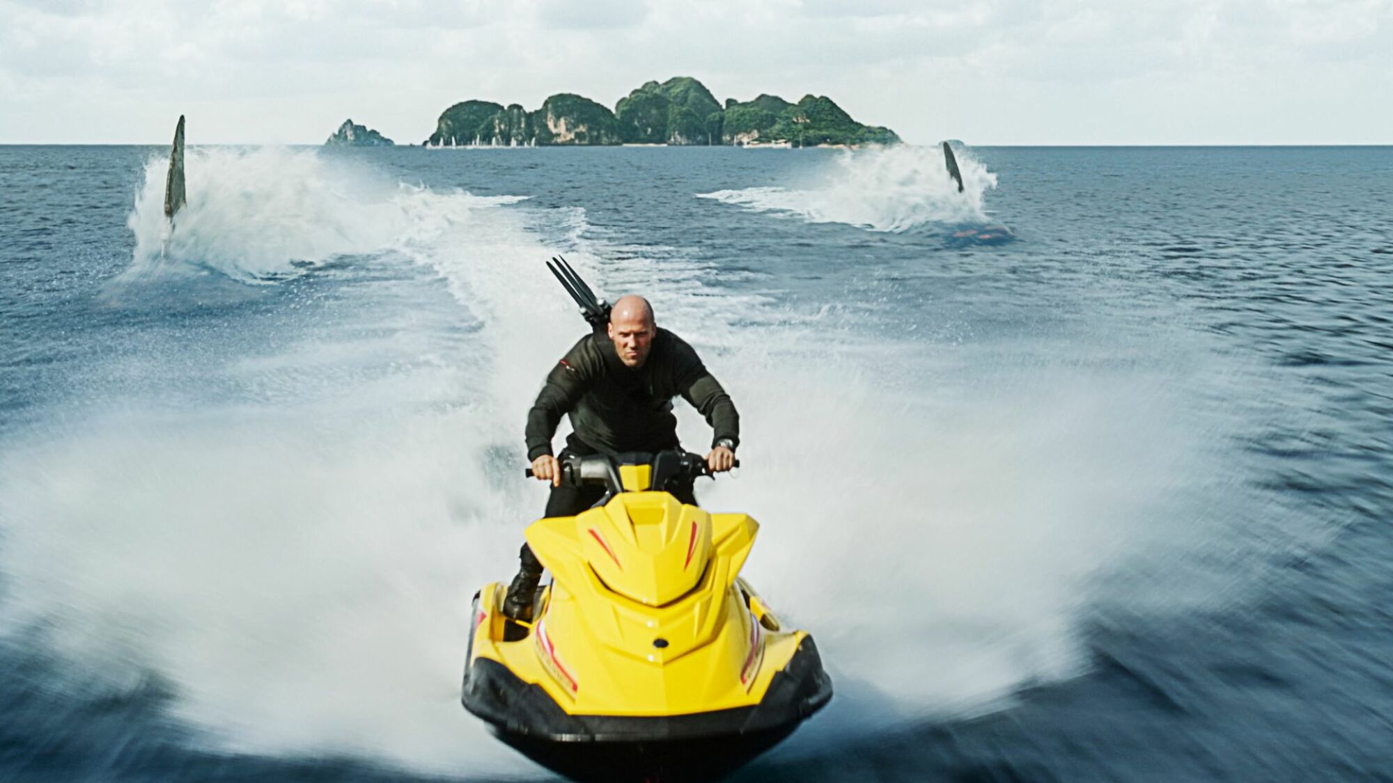 Jason Statham races away from a megladon in "Meg 2: The Trench."