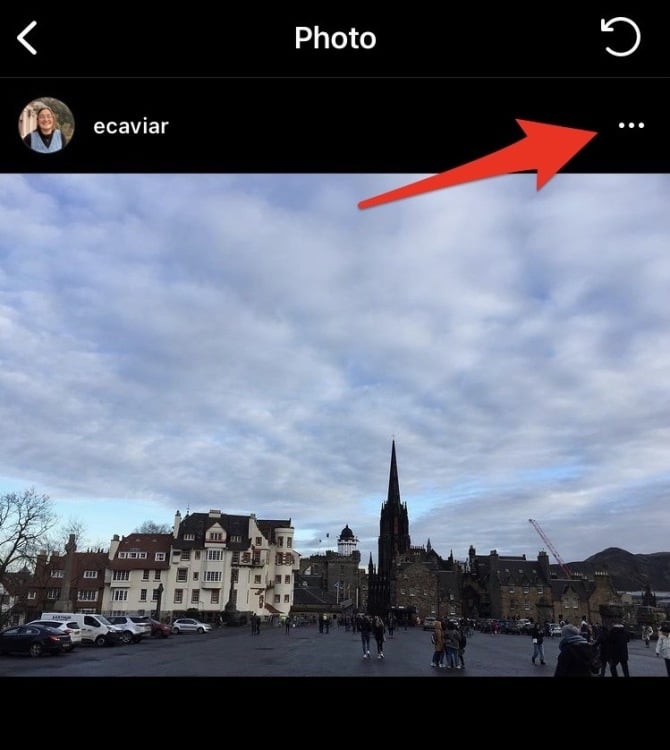 Screenshot of a recently deleted Instagram post with a red arrow pointing to the three dots in the upper right hand corner.