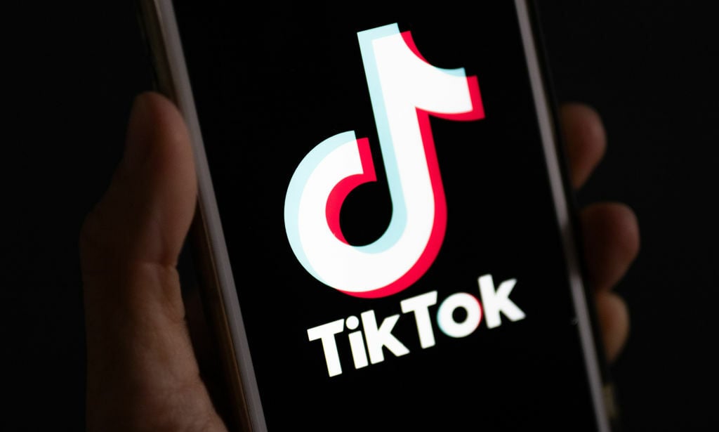 TikTok logo on a smartphone