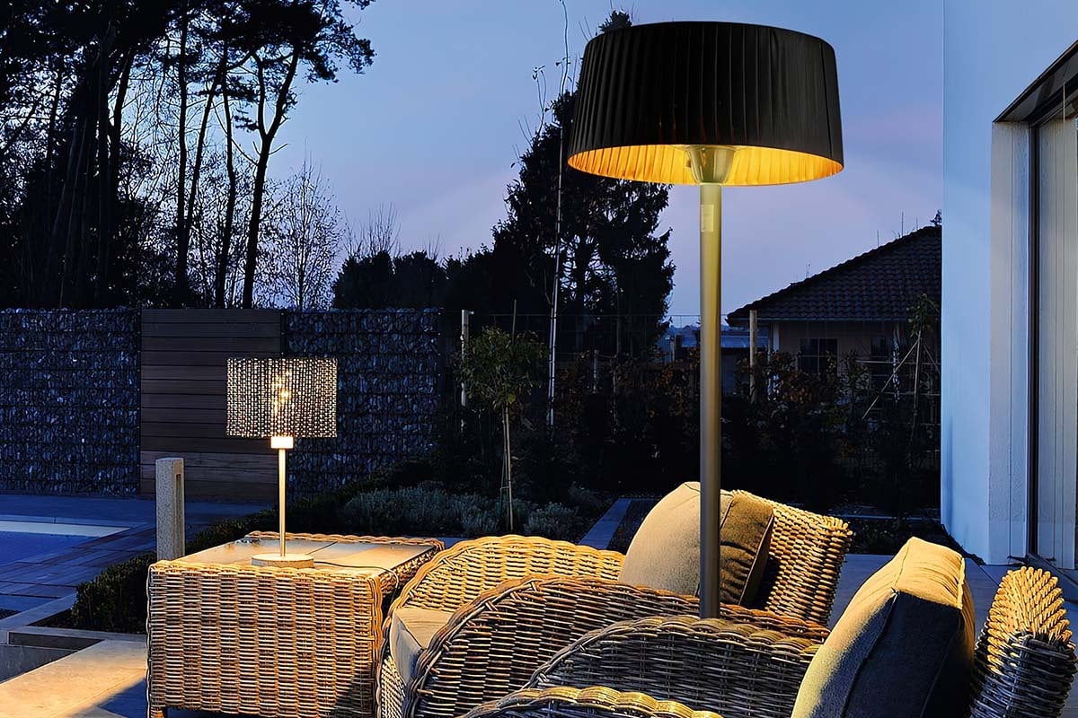 Lamp and couches outside.