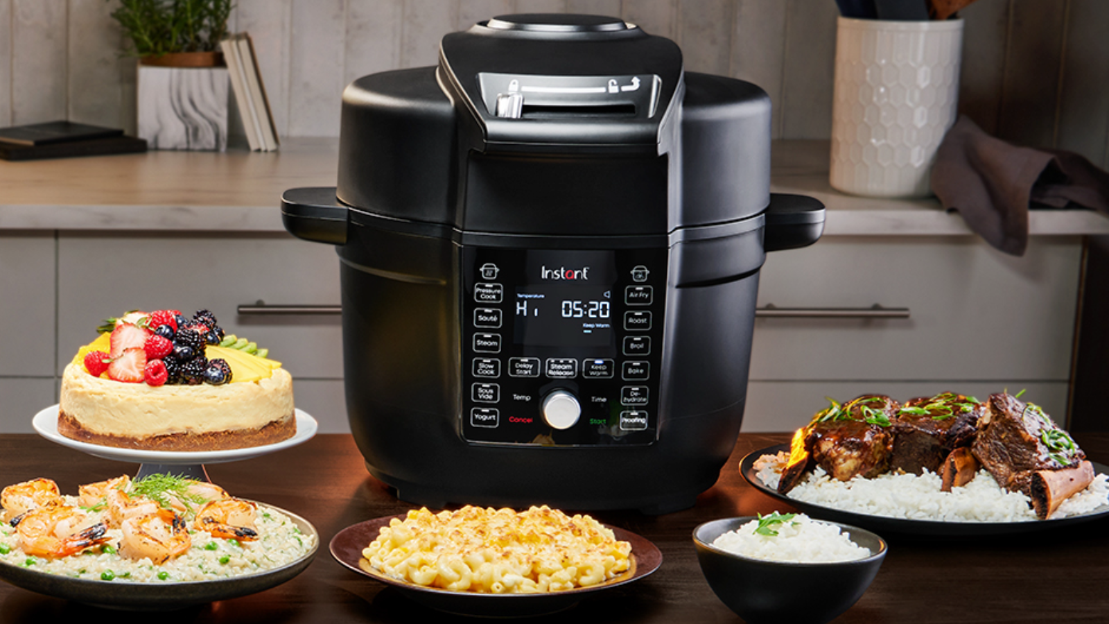 Instant Pot Duo Crisp Ultimate Lid on countertop with plates of food