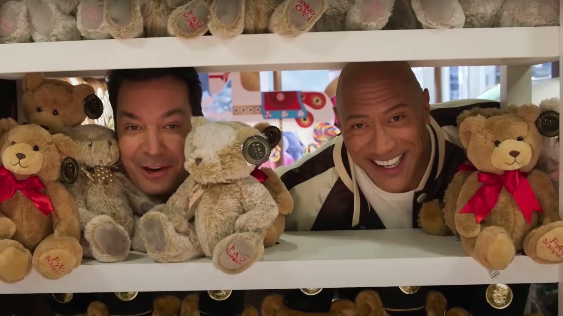 Two men poke their heads through rows of stuffed bears on a toy store shelf.