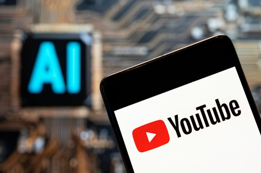 YouTube logo on a smartphone with a chip that says 