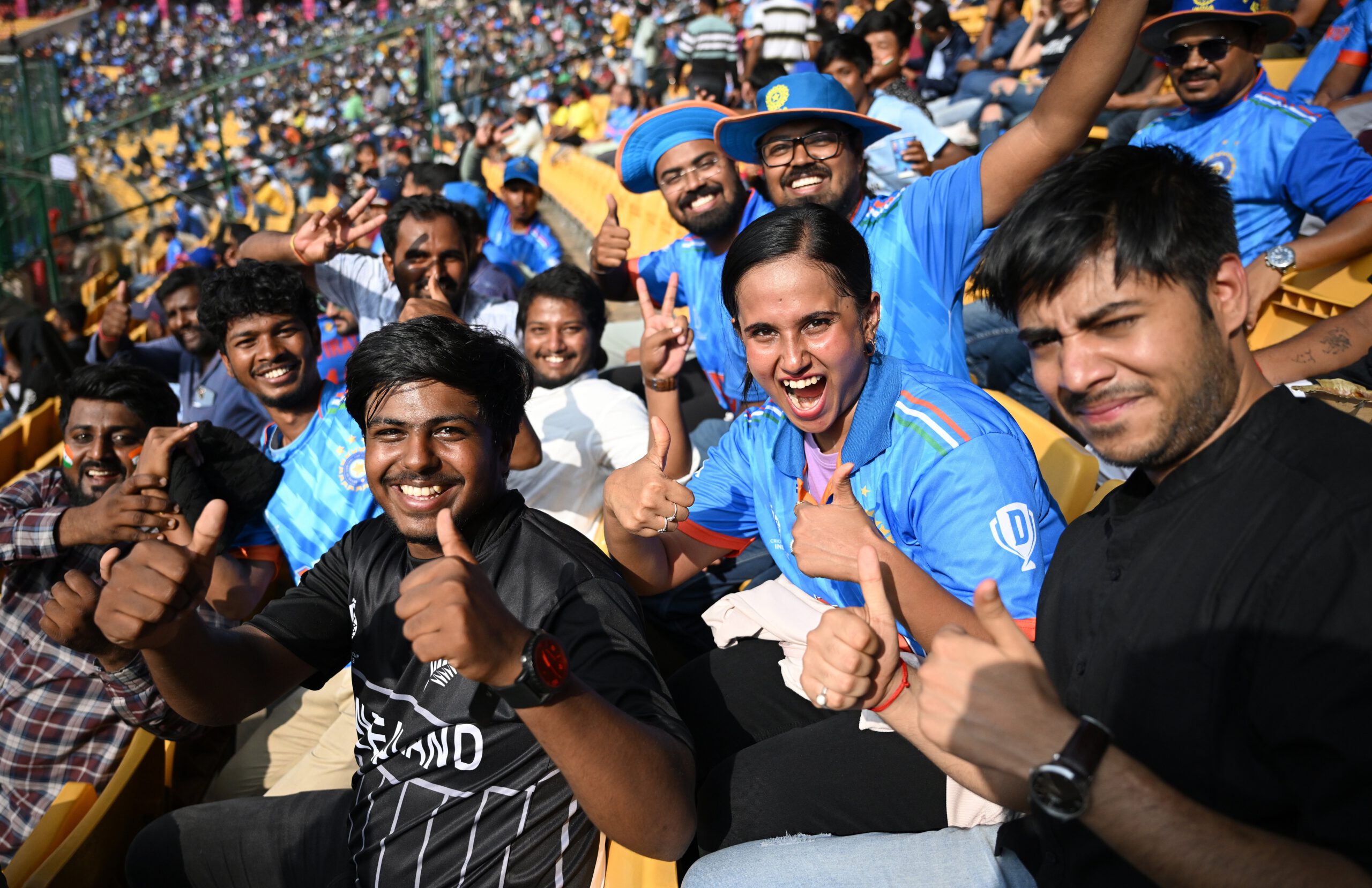 Spectators react in the crowd during the ICC Men's Cricket World Cup