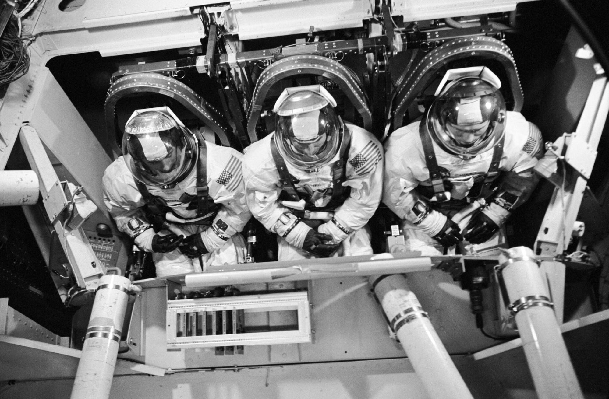 The Apollo 8 crew in training at the Flight Acceleration Facility. Borman is on the right.