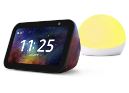 The Echo Show 5 (3rd Gen) Kids with a yellow Echo Glow overlaid on a white background