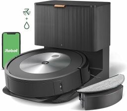 Roomba on self emptying dock with external water tank and smartphone with green iRobot screen
