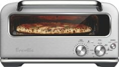 the Breville Smart Oven Pizzaiolo cooking a pizza