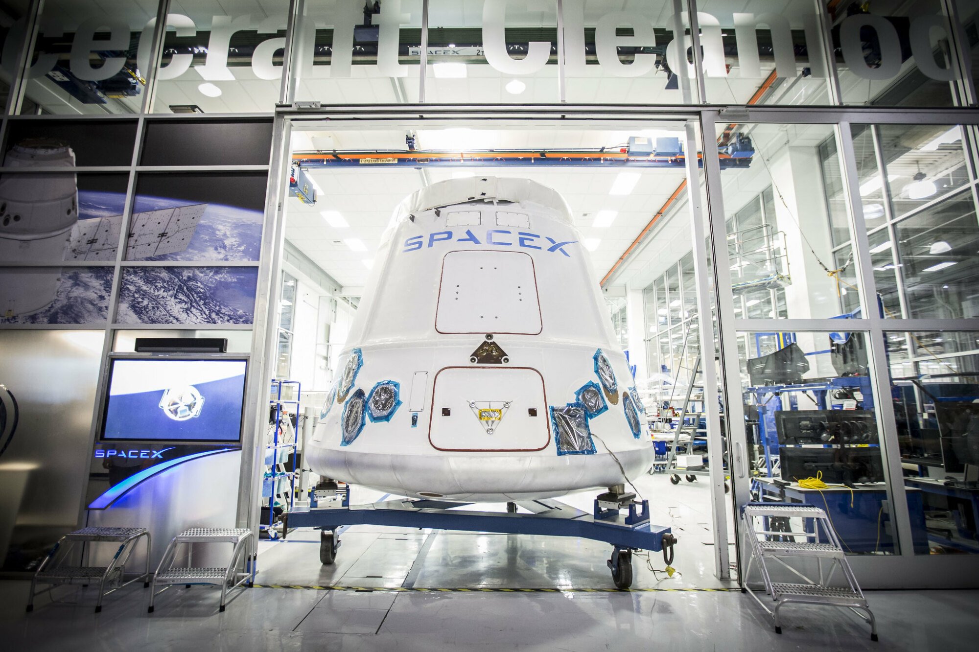 SpaceX Dragon crew capsule departing headquarters