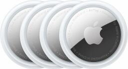 four apple airtag trackers on white background