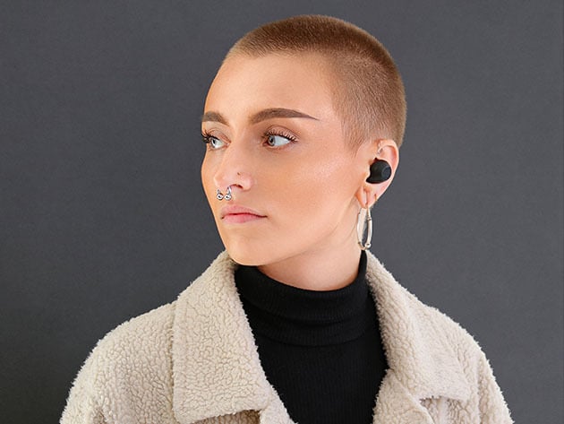 woman wearing earbuds