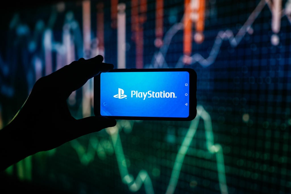 PlayStation logo on phone screen