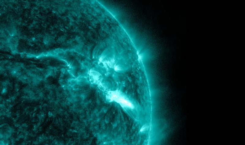  The image shows a subset of extreme ultraviolet light that highlights the extremely hot material in flares, and which is colorized in teal.