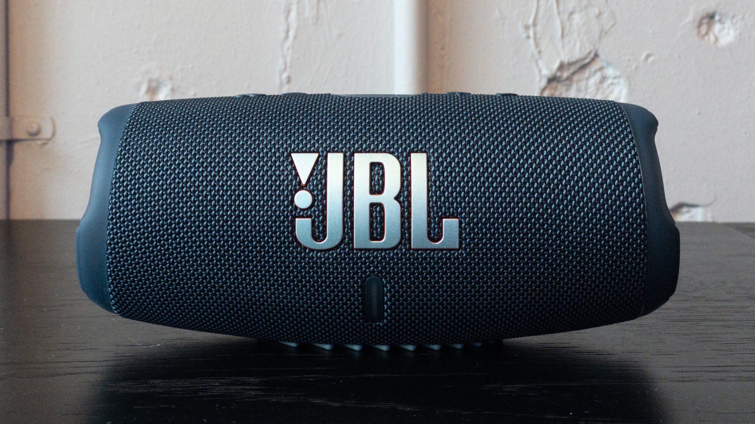 cylindrical speaker with JBL emblem