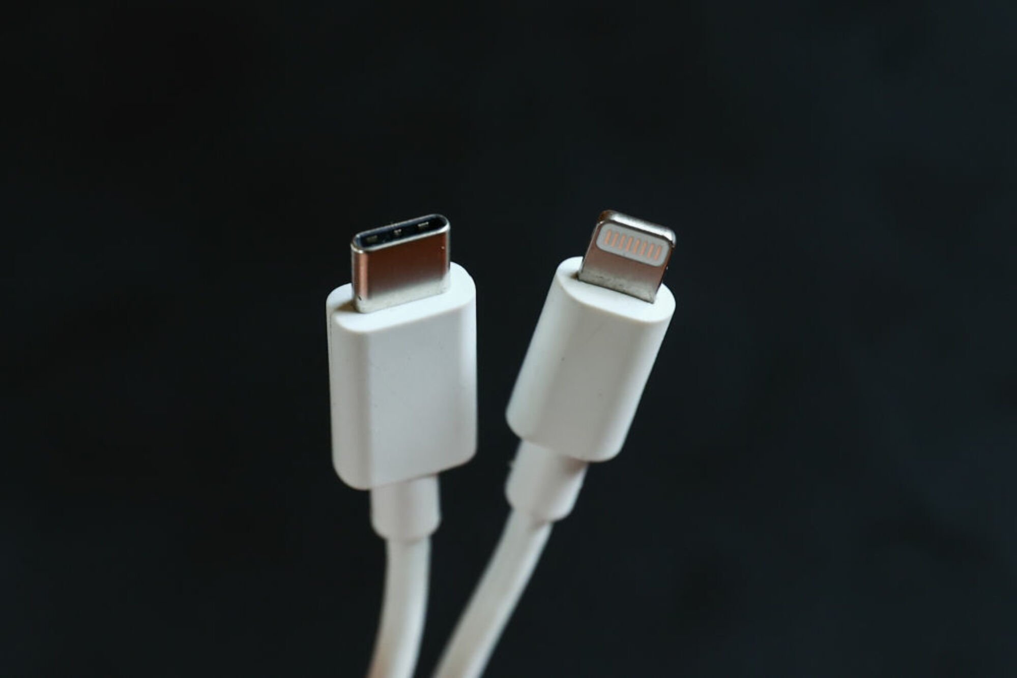 up close image of a USB-C cable and a Lightning cable
