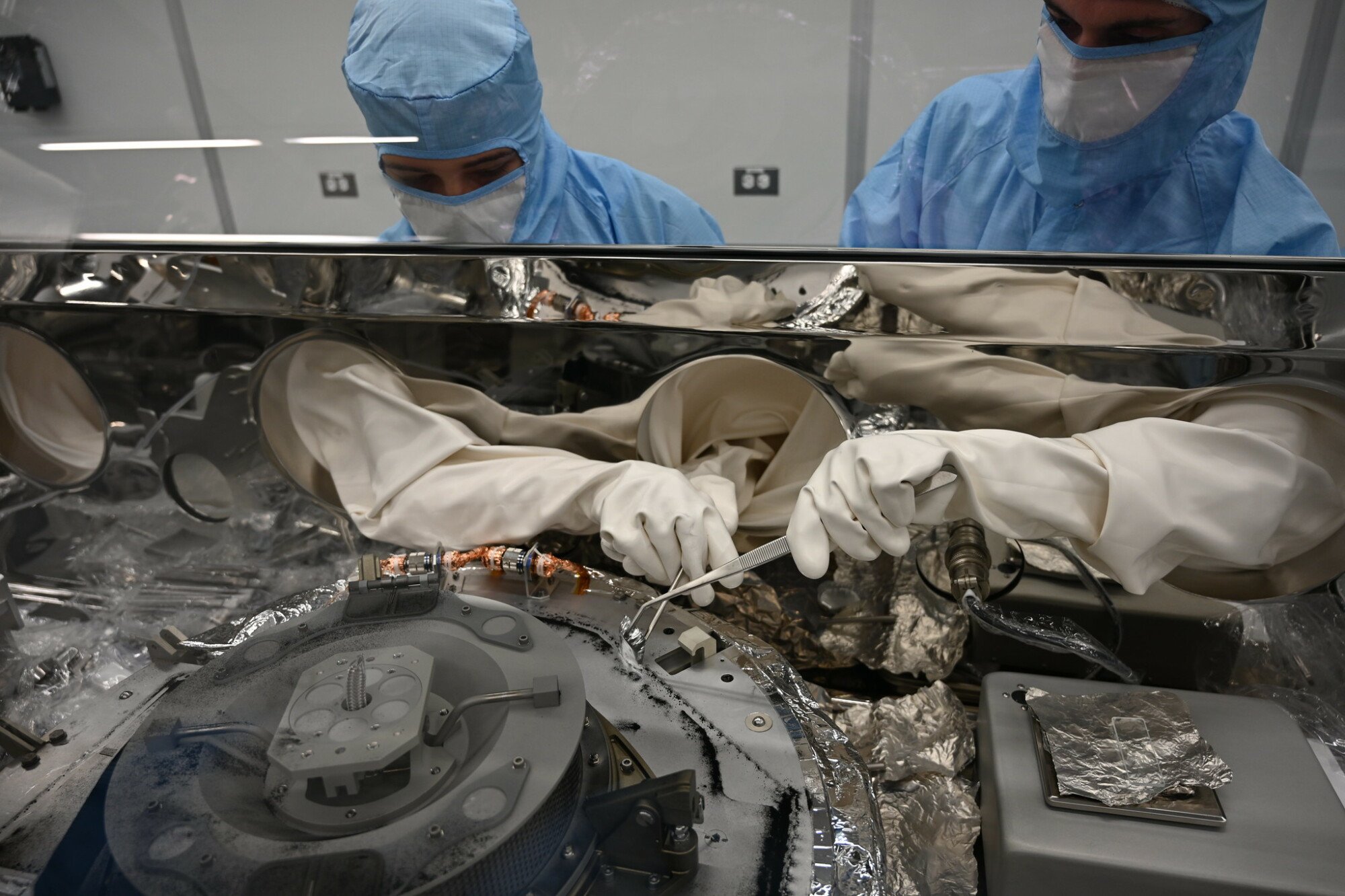 NASA handling the asteroid sample container
