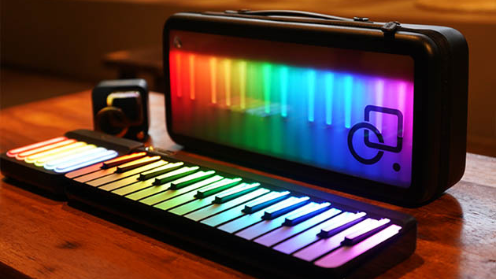 popupiano portable keyboard lit up with rainbow lights