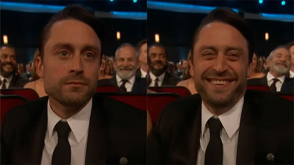 Two side-by-side images show a man sitting in an audience with a deadpan, serious face and then the same man laughing in the next image.